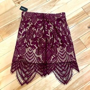 NWT Express maroon floral lace skirt. 00